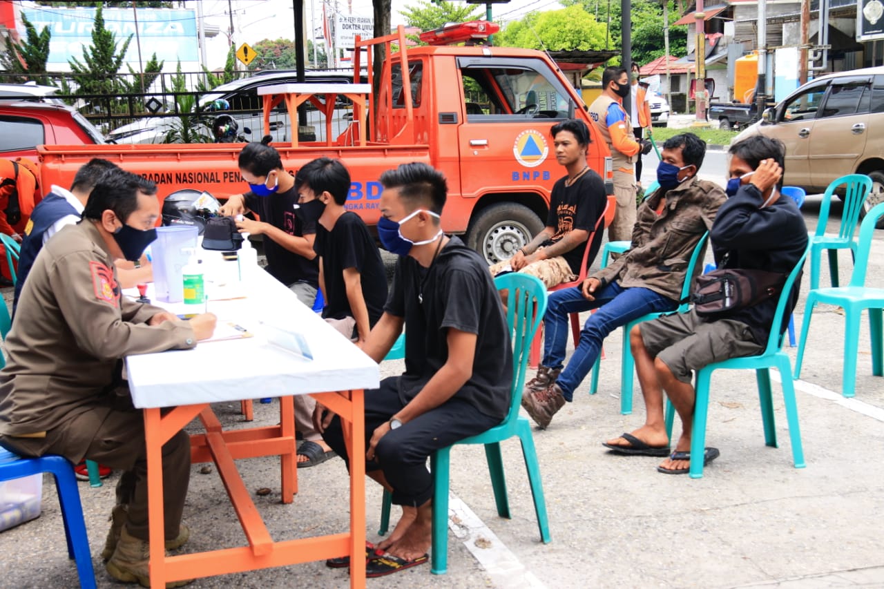 OPERASI YUSTISI - Puluhan Orang Tanpa Masker Disanksi