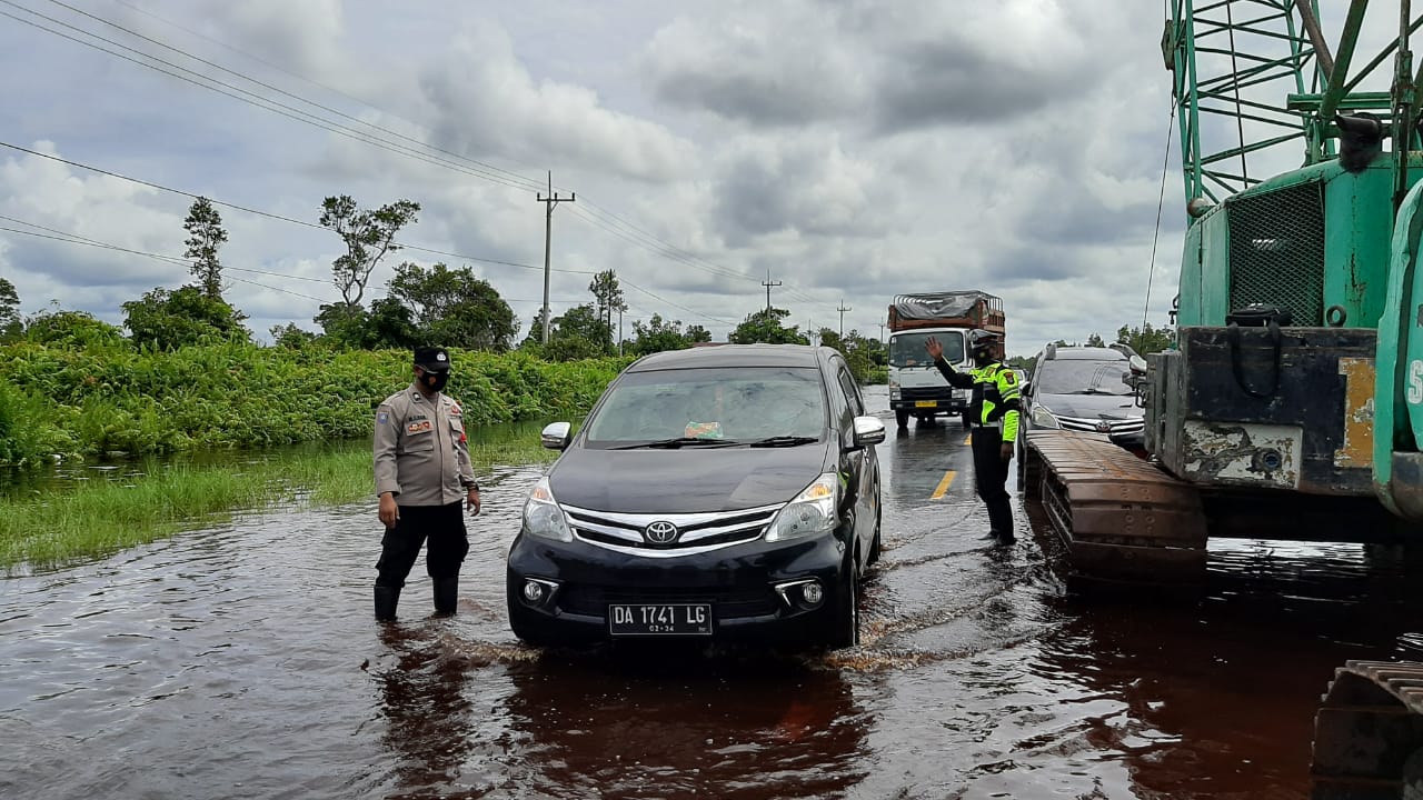 BUKIT RAWI LANGGANAN BANJIR