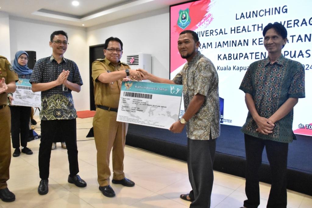 Pj Bupati Kapuas Launching UHC Program JKN-KIS