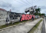 Grafiti Suporter Rusak Pemandangan RTA Milono