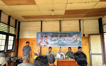 Polsek Danau Sembuluh Kawal Penyaluran Bansos Huma Betang