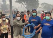 Fairid Naparin Serahkan 10 Mesin Pompa ke Redkar